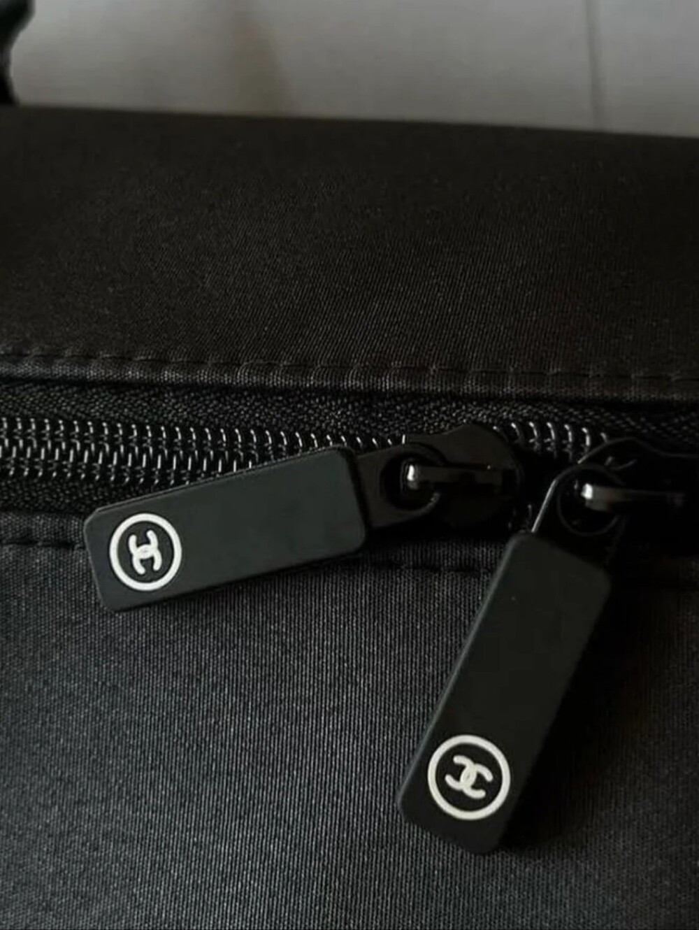 CHANEL Black Duffel with White Or Black CC Emblem - Picture 5 of 10